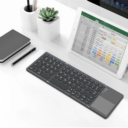 FoldPad™ | Typ comfortabel op uw telefoon, laptop of tablet, waar u ook bent